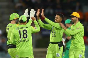 CANBERRA, AUSTRALIA - DECEMBER 29: Tanveer Sangha of the Thunder celebrates after dismissing Hilton Cartwright of the Stars during the Big Bash League match between Sydney Thunder and the Melbourne Stars at Manuka Oval, on December 29, 2020, in Canberra, Australia. (Photo by Mike Owen/Getty Images)
