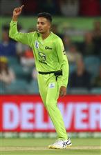 CANBERRA, AUSTRALIA - DECEMBER 29: Tanveer Sangha of the Thunder celebrates after dismissing Hilton Cartwright of the Stars during the Big Bash League match between Sydney Thunder and the Melbourne Stars at Manuka Oval, on December 29, 2020, in Canberra, Australia. (Photo by Mike Owen/Getty Images)