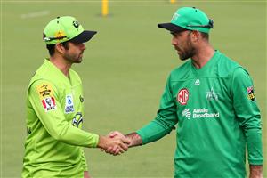 CANBERRA, AUSTRALIA - DECEMBER 29: Callum Ferguson of the Thunder and Glenn Maxwell of the Stars shake hands prior to the Big Bash League match between Sydney Thunder and the Melbourne Stars at Manuka Oval, on December 29, 2020, in Canberra, Australia. (Photo by Mike Owen/Getty Images)