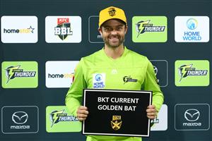 CANBERRA, AUSTRALIA - DECEMBER 29: Callum Ferguson of the Thunder poses with the BKT Current Golden Bat award after the Big Bash League match between Sydney Thunder and the Melbourne Stars at Manuka Oval, on December 29, 2020, in Canberra, Australia. (Photo by Mike Owen/Getty Images)