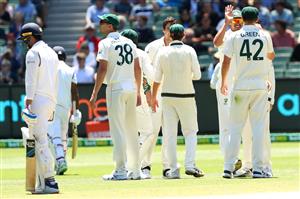 MELBOURNE, AUSTRALIA - DECEMBER 29: Australia celebrates the dismissal of Cheteshwar Pujara of India during day four of the Second Test match between Australia and India at Melbourne Cricket Ground on December 29, 2020 in Melbourne, Australia. (Photo by Kelly Defina/Getty Images)