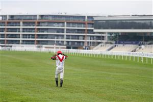NEWBURY, ENGLAND - DECEMBER 29: Sean Bowen make his return after being unseated from Equus Dancer at the last during The MansionBet's Bet 10 Get 20 Novices' Limited Handicap Chase at Newbury Racecourse on December 29, 2020 in Newbury, England. Owners are allowed to attend if they have a runner at the meeting otherwise racing remains behind closed doors to the public due to the Coronavirus pandemic. (Photo by Alan Crowhurst/Getty Images)