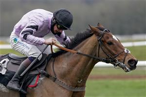 NEWBURY, ENGLAND - DECEMBER 29: Anugus Cheleda riding Calva D'Auge clear the last to win The MansionBet's Watch And Bet Handicap Hurdle at Newbury Racecourse on December 29, 2020 in Newbury, England. Owners are allowed to attend if they have a runner at the meeting otherwise racing remains behind closed doors to the public due to the Coronavirus pandemic. (Photo by Alan Crowhurst/Getty Images)