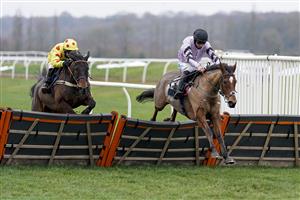 NEWBURY, ENGLAND - DECEMBER 29: Anugus Cheleda riding Calva D'Auge clear the last to win The MansionBet's Watch And Bet Handicap Hurdle at Newbury Racecourse on December 29, 2020 in Newbury, England. Owners are allowed to attend if they have a runner at the meeting otherwise racing remains behind closed doors to the public due to the Coronavirus pandemic. (Photo by Alan Crowhurst/Getty Images)