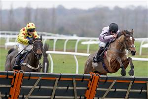 NEWBURY, ENGLAND - DECEMBER 29: Anugus Cheleda riding Calva D'Auge clear the last to win The MansionBet's Watch And Bet Handicap Hurdle at Newbury Racecourse on December 29, 2020 in Newbury, England. Owners are allowed to attend if they have a runner at the meeting otherwise racing remains behind closed doors to the public due to the Coronavirus pandemic. (Photo by Alan Crowhurst/Getty Images)