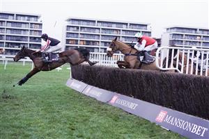NEWBURY, ENGLAND - DECEMBER 29: Charlie Deutsch riding Funambule Sivola on their way to winning The MansionBet's Faller Insurance Handicap Chase at Newbury Racecourse on December 29, 2020 in Newbury, England. Owners are allowed to attend if they have a runner at the meeting otherwise racing remains behind closed doors to the public due to the Coronavirus pandemic. (Photo by Alan Crowhurst/Getty Images)