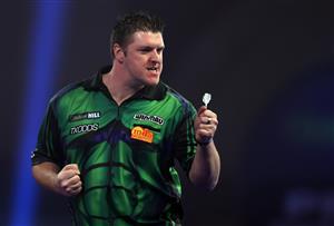 LONDON, ENGLAND - DECEMBER 29: Daryl Gurney of Northern Ireland reacts during his third round match against Chris Dobey of England during day twelve of the PDC William Hill World Darts Championship at Alexandra Palace on December 29, 2020 in London, England. (Photo by Luke Walker/Getty Images)