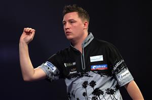 LONDON, ENGLAND - DECEMBER 29: Chris Dobey of England reacts during his third round match against Daryl Gurney of Northern Ireland during day twelve of the PDC William Hill World Darts Championship at Alexandra Palace on December 29, 2020 in London, England. (Photo by Luke Walker/Getty Images)