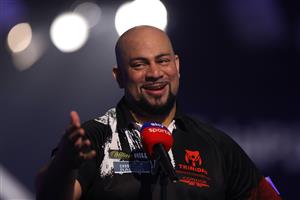 LONDON, ENGLAND - DECEMBER 29: Devon Petersen of South Africa talks to Sky Sports during his third round match against Jason Lowe of England during day twelve of the PDC William Hill World Darts Championship at Alexandra Palace on December 29, 2020 in London, England. (Photo by Luke Walker/Getty Images)
