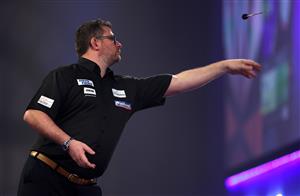 LONDON, ENGLAND - DECEMBER 29: James Wade in action during his third round match against Stephen Bunting of England during day twelve of the PDC William Hill World Darts Championship at Alexandra Palace on December 29, 2020 in London, England. (Photo by Luke Walker/Getty Images)