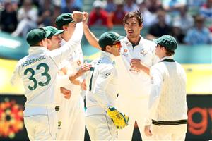 MELBOURNE, AUSTRALIA - DECEMBER 29: Mitchell Starc of Australia (R) celebrates the dismissal of Mayank Agarwal of India during day four of the Second Test match between Australia and India at Melbourne Cricket Ground on December 29, 2020 in Melbourne, Australia. (Photo by Kelly Defina/Getty Images)