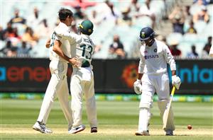 MELBOURNE, AUSTRALIA - DECEMBER 29: Mitchell Starc of Australia celebrates taking the wicket of Mayank Agarwal of India during day four of the Second Test match between Australia and India at Melbourne Cricket Ground on December 29, 2020 in Melbourne, Australia. (Photo by Robert Cianflone/Getty Images)