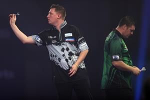 LONDON, ENGLAND - DECEMBER 29: Chris Dobey of England in action during his third round match against Daryl Gurney of Northern Ireland during day twelve of the PDC William Hill World Darts Championship at Alexandra Palace on December 29, 2020 in London, England. (Photo by Luke Walker/Getty Images)