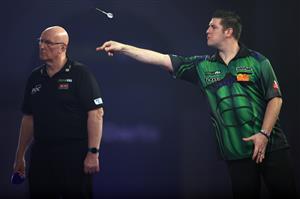 LONDON, ENGLAND - DECEMBER 29: Daryl Gurney of Northern Ireland in action during his third round match against Chris Dobey of England during day twelve of the PDC William Hill World Darts Championship at Alexandra Palace on December 29, 2020 in London, England. (Photo by Luke Walker/Getty Images)