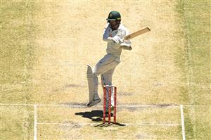 MELBOURNE, AUSTRALIA - DECEMBER 29: Nathan Lyon of Australia bats during day four of the Second Test match between Australia and India at Melbourne Cricket Ground on December 29, 2020 in Melbourne, Australia. (Photo by Quinn Rooney/Getty Images)