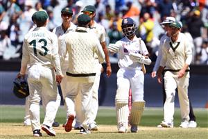 Australian players congratulate India