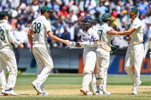 Australian players congratulate India