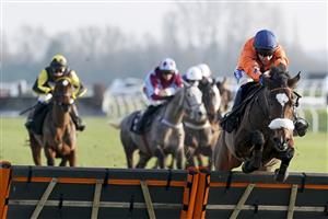 NEWBURY, ENGLAND - DECEMBER 29: Tom Scudamore riding Panic Attack clear the last to win The MansionBet Cheers To 2021 Mares' Handicap Hurdle at Newbury Racecourse on December 29, 2020 in Newbury, England. Owners are allowed to attend if they have a runner at the meeting otherwise racing remains behind closed doors to the public due to the Coronavirus pandemic. (Photo by Alan Crowhurst/Getty Images)