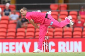 GOLD COAST, AUSTRALIA - DECEMBER 29: Stephen O'Keefe of the Sixers bowls during the Big Bash League match between the Melbourne Renegades and the Sydney Sixers at Metricon Stadium, on December 29, 2020, in Gold Coast, Australia. (Photo by Chris Hyde/Getty Images)