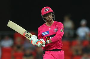 GOLD COAST, AUSTRALIA - DECEMBER 29: Josh Philippe of the Sixers leaves the field after being dismissed during the Big Bash League match between the Melbourne Renegades and the Sydney Sixers at Metricon Stadium, on December 29, 2020, in Gold Coast, Australia. (Photo by Chris Hyde/Getty Images)