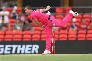 GOLD COAST, AUSTRALIA - DECEMBER 29: Stephen O'Keefe of the Sixers bowls during the Big Bash League match between the Melbourne Renegades and the Sydney Sixers at Metricon Stadium, on December 29, 2020, in Gold Coast, Australia. (Photo by Chris Hyde/Getty Images)