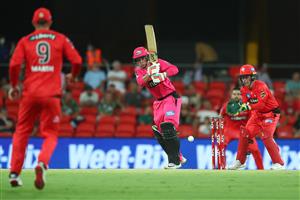 GOLD COAST, AUSTRALIA - DECEMBER 29: Josh Philippe of the Sixers bats during the Big Bash League match between the Melbourne Renegades and the Sydney Sixers at Metricon Stadium, on December 29, 2020, in Gold Coast, Australia. (Photo by Chris Hyde/Getty Images)