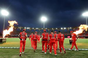 GOLD COAST, AUSTRALIA - DECEMBER 29: Renegades run onto the field during the Big Bash League match between the Melbourne Renegades and the Sydney Sixers at Metricon Stadium, on December 29, 2020, in Gold Coast, Australia. (Photo by Chris Hyde/Getty Images)