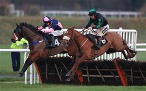 MARKET RASEN, ENGLAND - DECEMBER 30: Golden Emblem ridden by Sam Twiston-Davies (right) jumps the last to win the Follow RacingTV On Twitter Novices' Handicap Hurdle at Market Rasen Racecourse on December 30, 2020 in Market Rasen, England. (Photo by Mike Egerton - Pool/Getty Images)