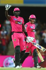 GOLD COAST, AUSTRALIA - DECEMBER 29: Jason Holder and Ben Manenti of the Sixers celebrate winning the Big Bash League match between the Melbourne Renegades and the Sydney Sixers at Metricon Stadium, on December 29, 2020, in Gold Coast, Australia. (Photo by Chris Hyde/Getty Images)