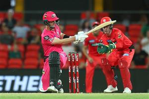 GOLD COAST, AUSTRALIA - DECEMBER 29: Jordan Silk of the Sixers bats during the Big Bash League match between the Melbourne Renegades and the Sydney Sixers at Metricon Stadium, on December 29, 2020, in Gold Coast, Australia. (Photo by Chris Hyde/Getty Images)