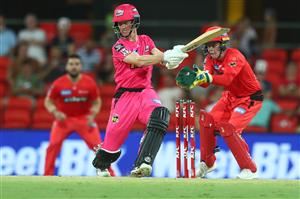 GOLD COAST, AUSTRALIA - DECEMBER 29: Jordan Silk of the Sixers bats during the Big Bash League match between the Melbourne Renegades and the Sydney Sixers at Metricon Stadium, on December 29, 2020, in Gold Coast, Australia. (Photo by Chris Hyde/Getty Images)