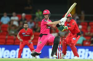 GOLD COAST, AUSTRALIA - DECEMBER 29: Jordan Silk of the Sixers bats during the Big Bash League match between the Melbourne Renegades and the Sydney Sixers at Metricon Stadium, on December 29, 2020, in Gold Coast, Australia. (Photo by Chris Hyde/Getty Images)