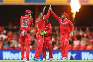 GOLD COAST, AUSTRALIA - DECEMBER 29: Mohammad Nabi of the Renegades celebrates after dismissing Daniel Hughes of the Sixers during the Big Bash League match between the Melbourne Renegades and the Sydney Sixers at Metricon Stadium, on December 29, 2020, in Gold Coast, Australia. (Photo by Chris Hyde/Getty Images)
