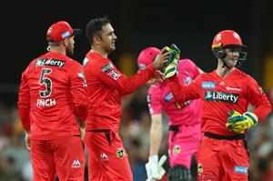 GOLD COAST, AUSTRALIA - DECEMBER 29: Mohammad Nabi of the Renegades celebrates after dismissing James Vince of the Sixers during the Big Bash League match between the Melbourne Renegades and the Sydney Sixers at Metricon Stadium, on December 29, 2020, in Gold Coast, Australia. (Photo by Chris Hyde/Getty Images)