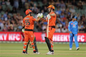 ADELAIDE, AUSTRALIA - DECEMBER 31: (L-R) Josh Inglis of the Perth Scorchers and Mitch Marsh of the Perth Scorchers celebrate during the Big Bash League match between the Adelaide Strikers and the Perth Scorchers at Adelaide Oval, on December 31, 2020, in Adelaide, Australia. (Photo by Daniel Kalisz/Getty Images)