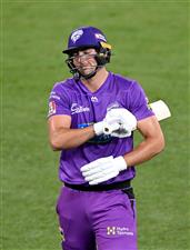 BRISBANE, AUSTRALIA - DECEMBER 30: Tim David of the Hurricanes looks dejected after losing his wicket during the Big Bash League match between the Hobart Hurricanes and Brisbane Heat at The Gabba, on December 30, 2020, in Brisbane, Australia. (Photo by Bradley Kanaris/Getty Images)