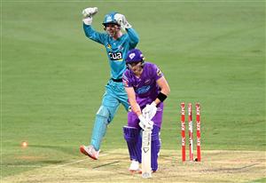 BRISBANE, AUSTRALIA - DECEMBER 30: Wil Parker of the Hurricanes is clean bowled by Mujeeb Ur Rahman of the Heat during the Big Bash League match between the Hobart Hurricanes and Brisbane Heat at The Gabba, on December 30, 2020, in Brisbane, Australia. (Photo by Bradley Kanaris/Getty Images)