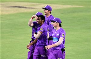 BRISBANE, AUSTRALIA - DECEMBER 30: Keemo Paul of the Hurricanes celebrates taking the wicket of Max Bryant of the Heat during the Big Bash League match between the Hobart Hurricanes and Brisbane Heat at The Gabba, on December 30, 2020, in Brisbane, Australia. (Photo by Bradley Kanaris/Getty Images)