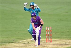 BRISBANE, AUSTRALIA - DECEMBER 30: Wil Parker of the Hurricanes is clean bowled by Mujeeb Ur Rahman of the Heat during the Big Bash League match between the Hobart Hurricanes and Brisbane Heat at The Gabba, on December 30, 2020, in Brisbane, Australia. (Photo by Bradley Kanaris/Getty Images)