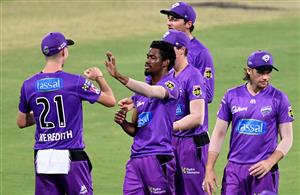 BRISBANE, AUSTRALIA - DECEMBER 30: Keemo Paul of the Hurricanes celebrates taking the wicket of Max Bryant of the Heat during the Big Bash League match between the Hobart Hurricanes and Brisbane Heat at The Gabba, on December 30, 2020, in Brisbane, Australia. (Photo by Bradley Kanaris/Getty Images)