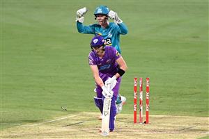 BRISBANE, AUSTRALIA - DECEMBER 30: Wil Parker of the Hurricanes is clean bowled by Mujeeb Ur Rahman of the Heat during the Big Bash League match between the Hobart Hurricanes and Brisbane Heat at The Gabba, on December 30, 2020, in Brisbane, Australia. (Photo by Bradley Kanaris/Getty Images)