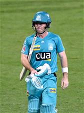 BRISBANE, AUSTRALIA - DECEMBER 30: Jimmy Peirson of the Heat looks dejected after losing his wicket during the Big Bash League match between the Hobart Hurricanes and Brisbane Heat at The Gabba, on December 30, 2020, in Brisbane, Australia. (Photo by Bradley Kanaris/Getty Images)