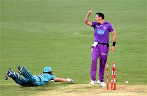 BRISBANE, AUSTRALIA - DECEMBER 30: Scott Bolland of the Hurricanes celebrates victory as Mark Steketee of the Heat is run out on the last bowl of the match during the Big Bash League match between the Hobart Hurricanes and Brisbane Heat at The Gabba, on December 30, 2020, in Brisbane, Australia. (Photo by Bradley Kanaris/Getty Images)