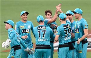 BRISBANE, AUSTRALIA - DECEMBER 30: Xavier Bartlett of the Heat celebrates taking the wicket of Darcy Short of the Hurricanes during the Big Bash League match between the Hobart Hurricanes and Brisbane Heat at The Gabba, on December 30, 2020, in Brisbane, Australia. (Photo by Bradley Kanaris/Getty Images)
