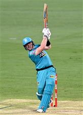 BRISBANE, AUSTRALIA - DECEMBER 30: Max Bryant of the Heat hits the ball over the boundary for a six during the Big Bash League match between the Hobart Hurricanes and Brisbane Heat at The Gabba, on December 30, 2020, in Brisbane, Australia. (Photo by Bradley Kanaris/Getty Images)