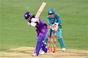 BRISBANE, AUSTRALIA - DECEMBER 30: Wil Parker of the Hurricanes is clean bowled by Mujeeb Ur Rahman of the Heat during the Big Bash League match between the Hobart Hurricanes and Brisbane Heat at The Gabba, on December 30, 2020, in Brisbane, Australia. (Photo by Bradley Kanaris/Getty Images)