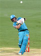 BRISBANE, AUSTRALIA - DECEMBER 30: Max Bryant of the Heat hits the ball over the boundary for a six during the Big Bash League match between the Hobart Hurricanes and Brisbane Heat at The Gabba, on December 30, 2020, in Brisbane, Australia. (Photo by Bradley Kanaris/Getty Images)