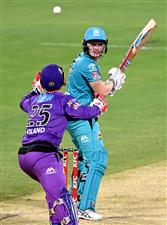 BRISBANE, AUSTRALIA - DECEMBER 30: Max Bryant of the Heat looks back as wicketkeeper Scott Bolland of the Hurricanes attempts to take a catch during the Big Bash League match between the Hobart Hurricanes and Brisbane Heat at The Gabba, on December 30, 2020, in Brisbane, Australia. (Photo by Bradley Kanaris/Getty Images)
