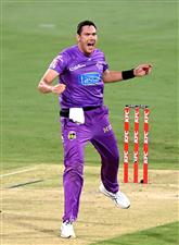 BRISBANE, AUSTRALIA - DECEMBER 30: Scott Bolland of the Hurricanes celebrates taking the wicket of Jack Wildermuth of the Heat during the Big Bash League match between the Hobart Hurricanes and Brisbane Heat at The Gabba, on December 30, 2020, in Brisbane, Australia. (Photo by Bradley Kanaris/Getty Images)