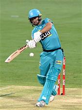 BRISBANE, AUSTRALIA - DECEMBER 30: Lewis Gregory of the Heat plays a shot during the Big Bash League match between the Hobart Hurricanes and Brisbane Heat at The Gabba, on December 30, 2020, in Brisbane, Australia. (Photo by Bradley Kanaris/Getty Images)